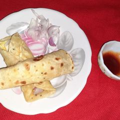 Chicken tikka kathi roll A picture of Chicken tikka kathi roll.