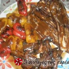 A picture of Grilled vegetables with balsamic vinegar and garlic oil.