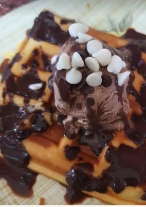 A picture of Waffle with chocolate ice cream.