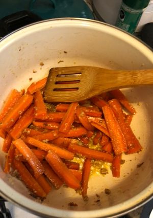 Una foto de Zanahorias con ajo y parmesano