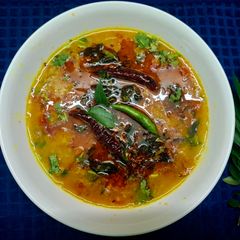 A picture of Masoor Dal with Tomato and Curry Leaf Tadka.