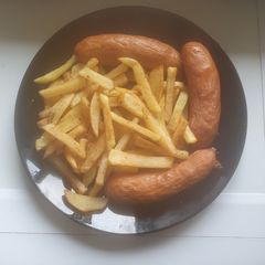 A picture of Boiled Sausage and Fries.