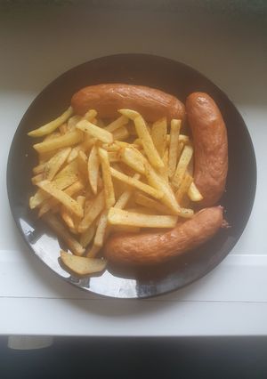 A picture of Boiled Sausage and Fries.