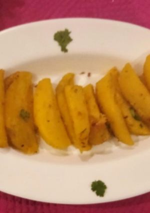 A picture of Potato wedges.