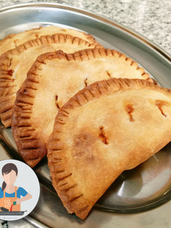 Una foto de Empanadillas dulces de pera y canela