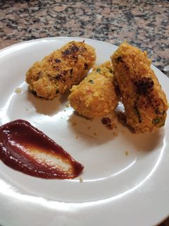 Una foto de Nuggets veganos de porotos alubias y zapallo