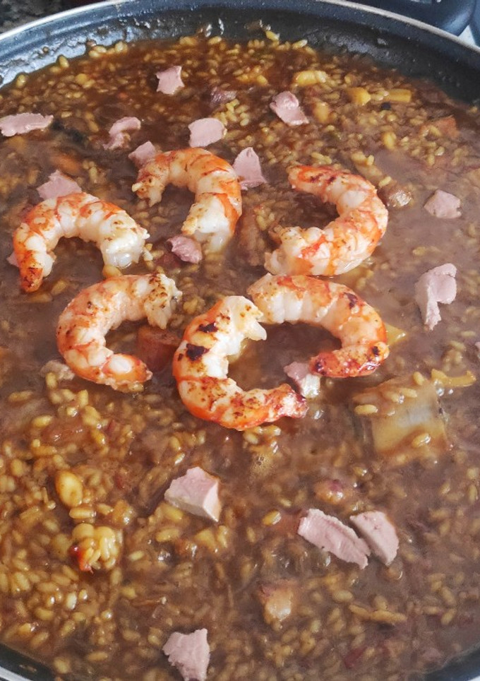 Una foto de Arroz meloso mar y montaña 💰 3'50€ / ración