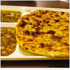 #Amritsari Naan-Punjabi Chanas A picture of #Amritsari Naan-Punjabi Chanas.