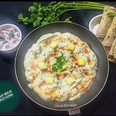 A picture of Shahi Malai Paneer Korma In White Gravy.