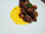 Pan roasted Pork Shoulder with Buttermilk Gravy and Corn Puree