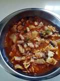 Potaje de repollo con champiñones y espárragos trigueros