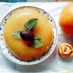 A picture of Orange and grapes pudding.