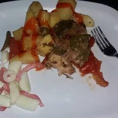 Deep fried chicken with deep fried potatoes A picture of Deep fried chicken with deep fried potatoes.