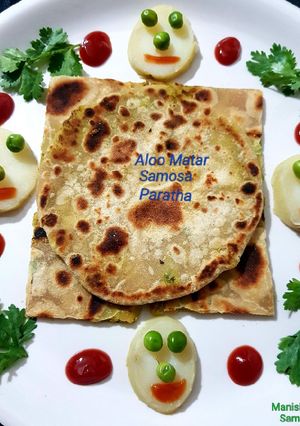A picture of Aloo Matar Samosa Paratha.
