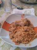 Arroz meloso de pollo al ajillo