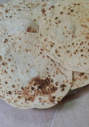 صورة لوصفة خبز يمني على التنور 😍😋