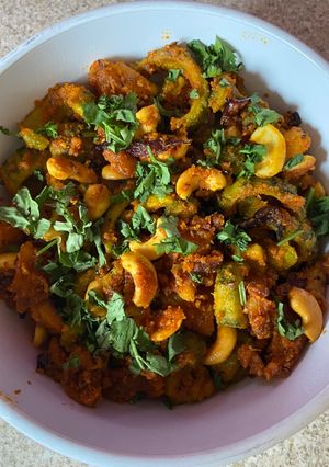 A picture of Kaju, karela batetanu shakCashews, Bittergourd and potato curry.