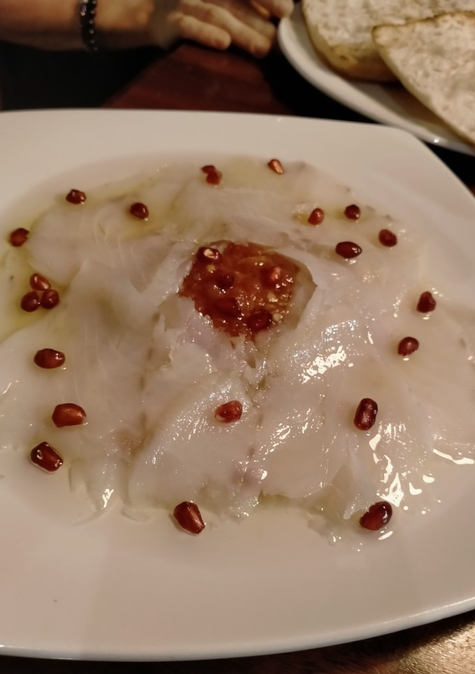 Una foto de Carpaccio de bacalao
