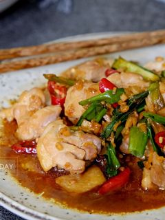 A picture of Stir-Fried Chicken with Scallions - Spicy and Tender, Perfect with Rice.