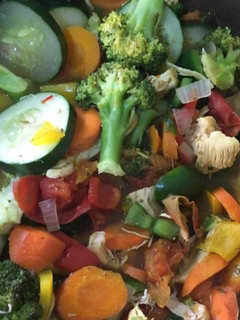 A picture of Italian chicken stir fly and vegetables.