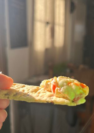 Una foto de Dip de queso crema con morrones caramelizados