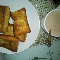 A picture of My fried bread and tea.