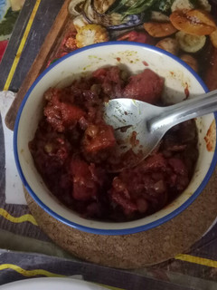 A picture of Aloo Matar in Beet curry.