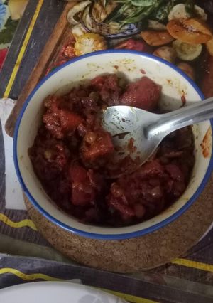 A picture of Aloo Matar in Beet curry.