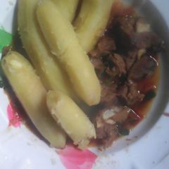 A picture of Boiled bananas served with stewed meat #authormarathon.