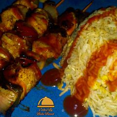 A picture of Shashlik with fried rice 🍚.