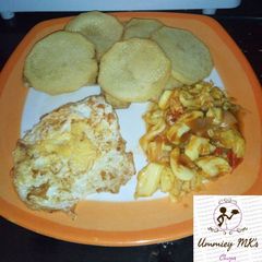 A picture of Yam with egg and cabbage sauce.