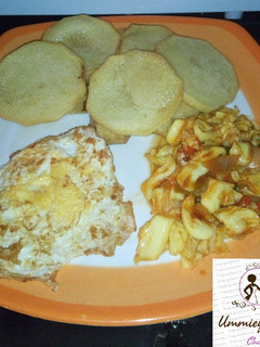A picture of Yam with egg and cabbage sauce.