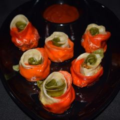A picture of Tri Colour Rose Chicken Momo.