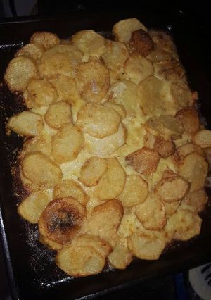 Una foto de Papas gratinadas