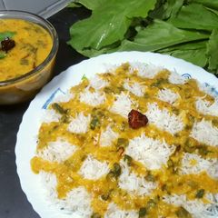 Moong Dal Palak with Boiled Rice 😋 A picture of Moong Dal Palak with Boiled Rice 😋.