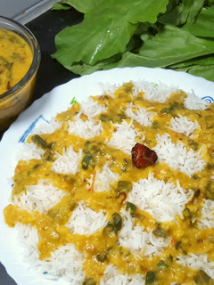 A picture of Moong Dal Palak with Boiled Rice 😋.