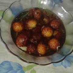 A picture of Rice ke gulab jamun.
