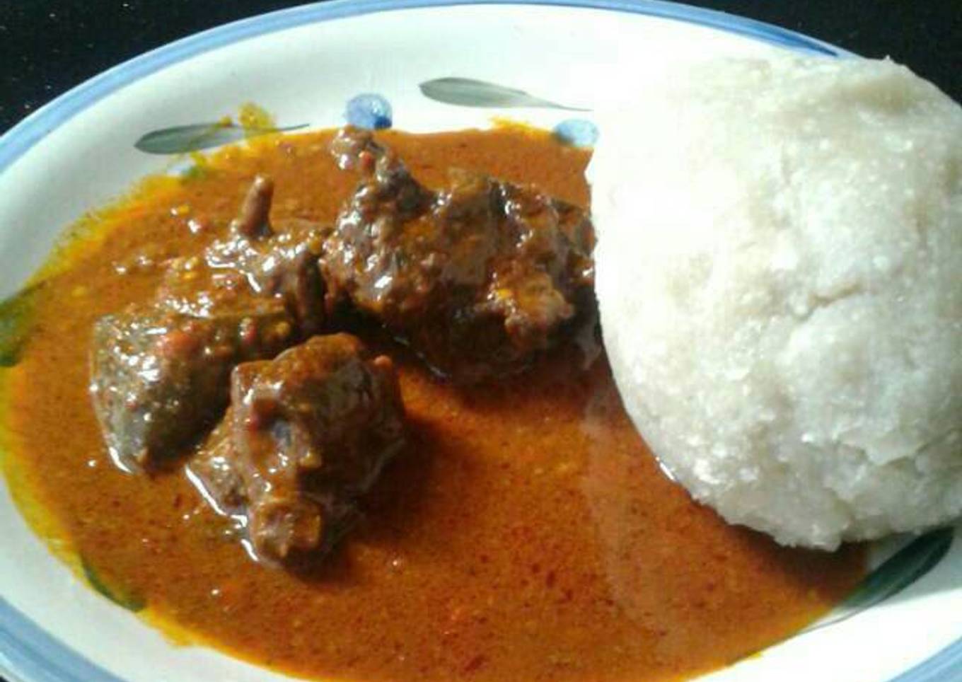 Plain ogbono soup and goat meat