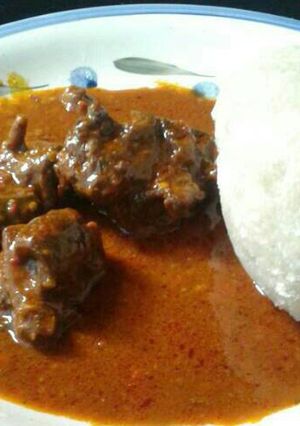 A picture of Plain ogbono soup and goat meat.