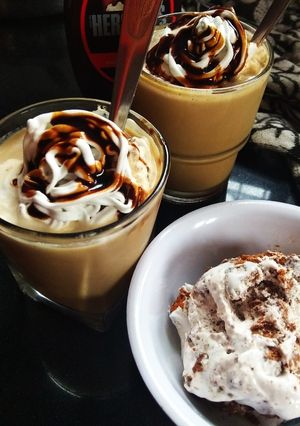 A picture of Frothy coffee with ice cream.