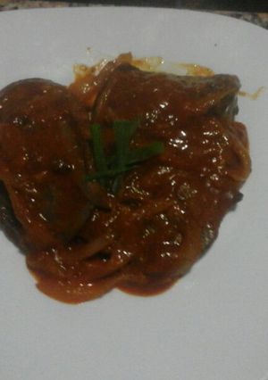 Una foto de Hígado de ternera encebollado con tomate