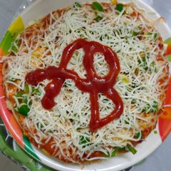 A picture of Pizza with lots of cheese.