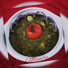 A picture of Aloo Palak with gravy.