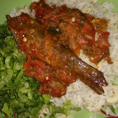 A picture of White rice + macaroni and fish stew.