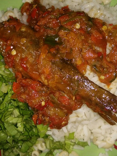 A picture of White rice + macaroni and fish stew.