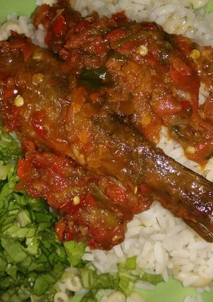 A picture of White rice + macaroni and fish stew.