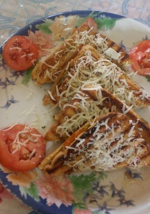 A picture of Vegetable stuffed cheese grilled sandwich.