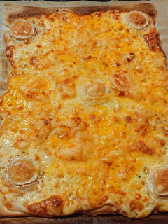 Una foto de Pizza 5 quesos