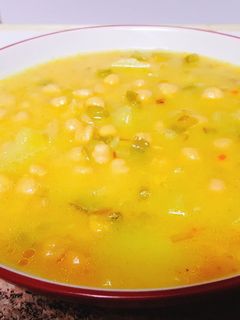 Una foto de Garbanzos al curry a mi manera
