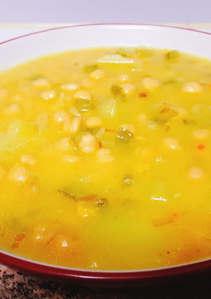 Una foto de Garbanzos al curry a mi manera